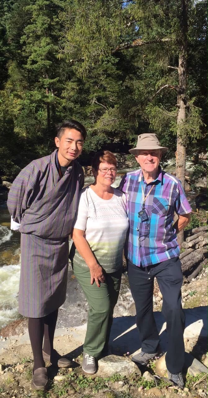 Pem Dorji with travelers in the Punakha valley
